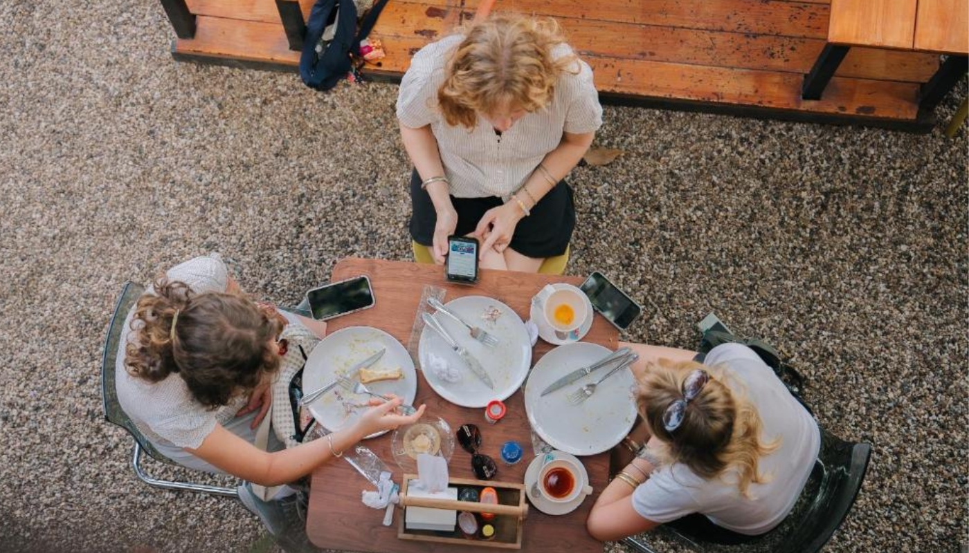 Pancake breakfast with caramel and strawberry topping