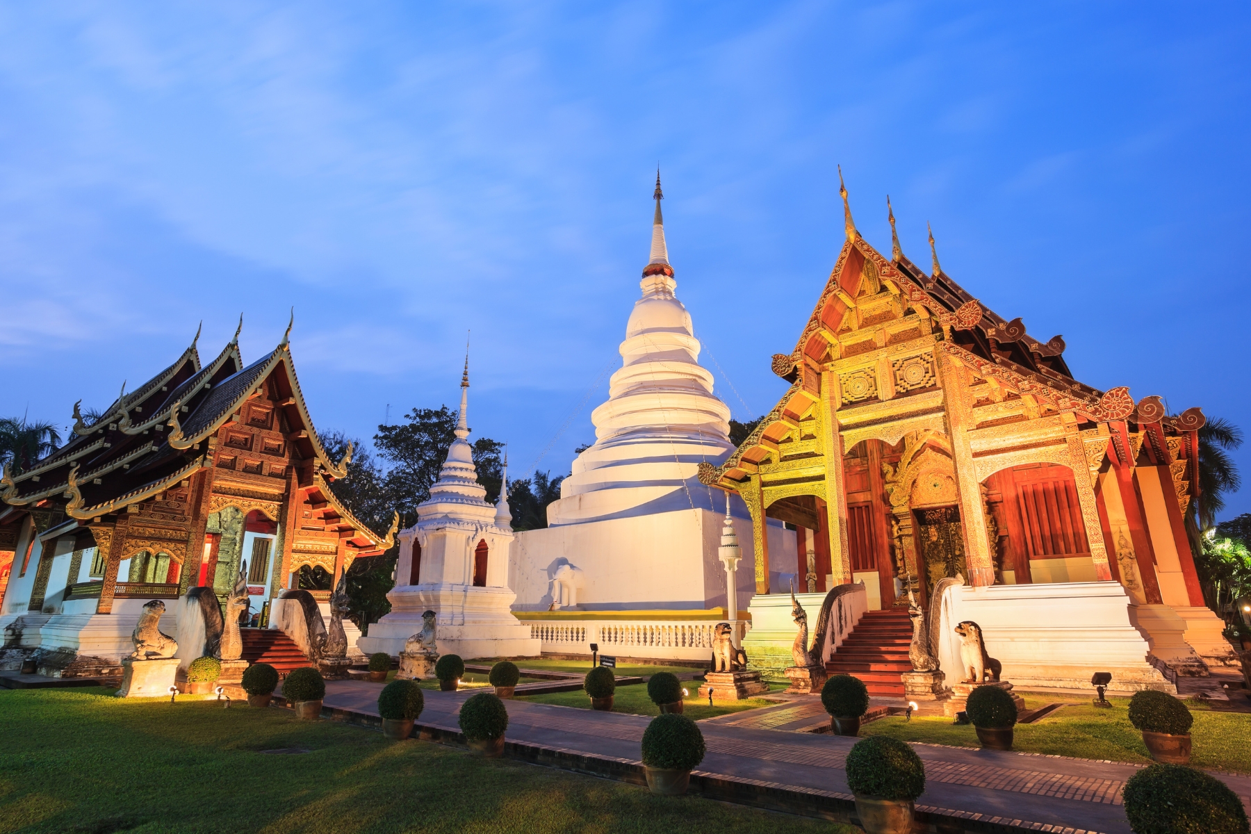 Warm exterior lighting and welcoming entrance atmosphere